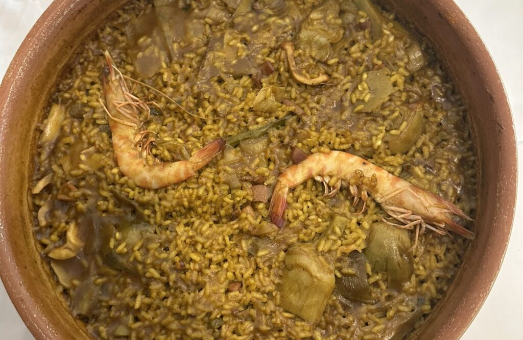 Neptuno, Arroceria cerca de Peñíscola. Arroz de langostino con alcachofa.